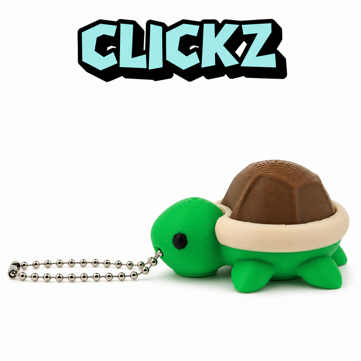 Alt-tekst foto 1
Groene Clickz-schildpad met een bruin schild en metalen sleutelhanger onder het Clickz-logo.